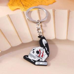 Gothic skull and black crow keychain with red detail on book pendant, zinc alloy