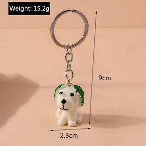 Detail view of a funny dog key chain with dimensions and weight in resin and metal material