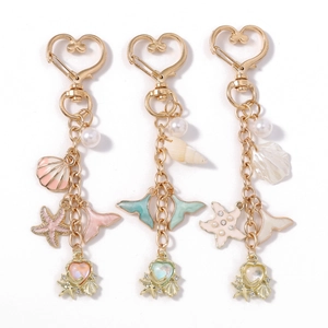 Fashion ocean theme keychains with seashell starfish mermaid charms in three colors