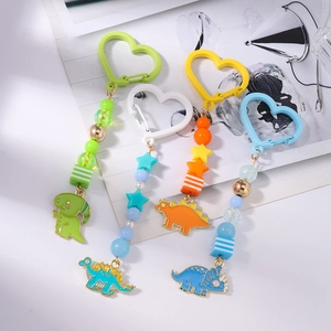 Porte-clés dinosaures colorés avec perles, mousquetons cœur et breloques en alliage