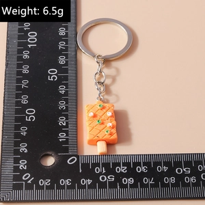 Mesure détaillée de la taille d'un porte-clés créatif en forme de glace à l'orange