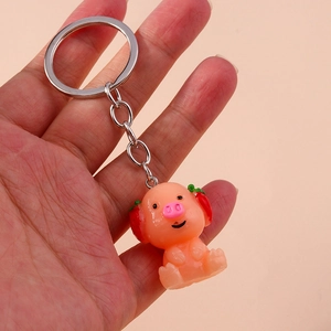 Cute pink resin pig keychain charm with metal ring and funny chili pepper detail