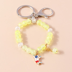 Astronaut keychain wristlet with yellow crackle beads and silver metal ring