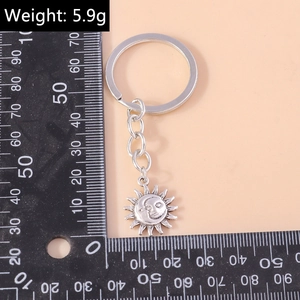 Detailed size measurement of celestial sun and moon keychain with 5.9g weight