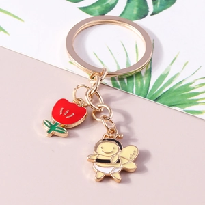 Goldener Schlüsselanhänger mit Tulpe und Biene Emaille Anhänger für Damen Taschen