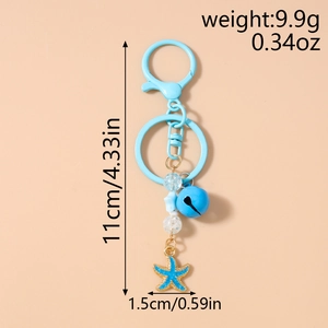 Détails des dimensions du porte-clés étoile de mer affichant 11 cm et éléments bleus