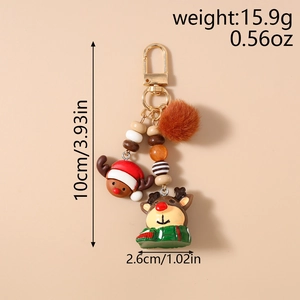 Detailed view of Christmas reindeer keychain with plush ball and size specifications