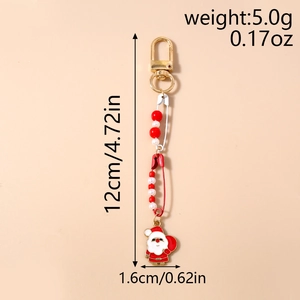 Detailed view of Santa Claus enamel charm with dimensions and weight specs for Christmas keychain