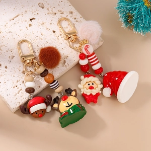 Plush Christmas Reindeer and Santa Keychain with colorful beads and golden lobster clasp