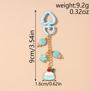 Dettaglio portachiavi lecca-lecca e torta con dimensioni di 9cm e un peso di 9,2g