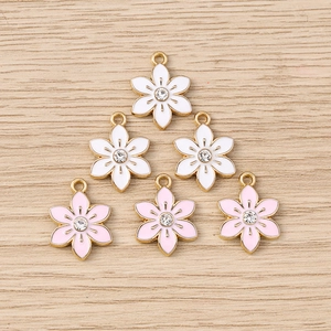 Floral keychain pendants with rhinestones in pink and white enamel for DIY jewelry