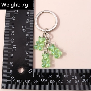 Detailed view of triple light green resin bear charms keychain with silver ring weight 7g