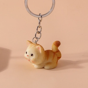 Detailed view of orange striped cat keychain with high quality silver ring and chain