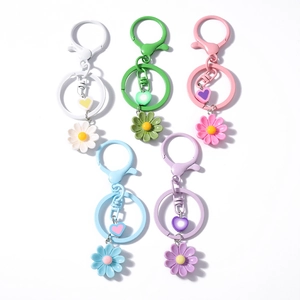 Set di 5 portachiavi a forma di margherita e cuore in colori pastello per borse