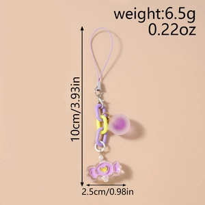Detail view of purple candy charm keychain showing 10cm length and 6.5g weight specs