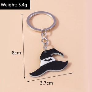 Detail view of a black Halloween witch hat keychain with a bat pattern and silver ring