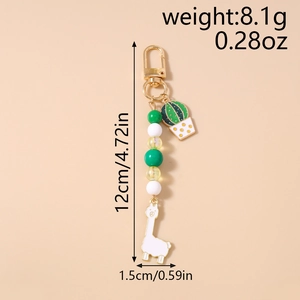 Detailed view of beaded keychain with cactus and alpaca charms showing size and weight specs