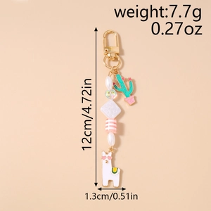 Beaded keychain with cactus and alpaca charms showing size and weight specs