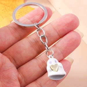 Simpatico portachiavi fantasma bianco con cuore dorato e anello d'argento