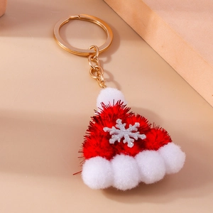 Llavero navideño de gorro rojo con pompones blancos y anillo metálico dorado fino