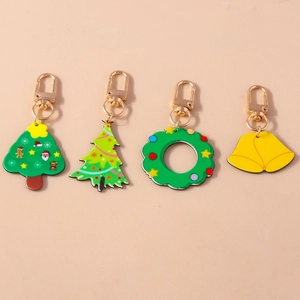 Set of 4 festive Christmas keychains featuring wreath, bells, and holiday trees