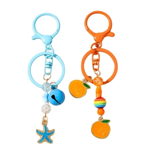 Porte-clés perlés colorés avec breloques étoile de mer, clochettes et tranches d'orange