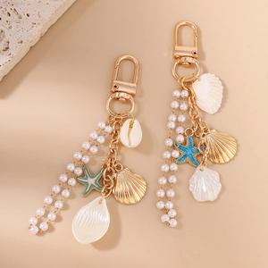 Marine themed pearl keychain with gold seashell starfish charms for bags and keys