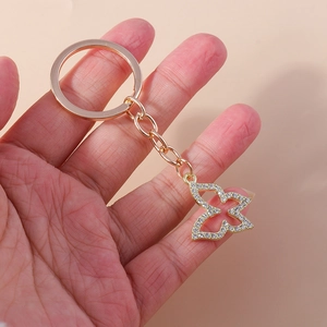 Porte-clés Papillon en Alliage de Zinc de Luxe Ajouré Strass Animal Anneau de Clé Pendentif Sac Charme pour Femmes Cadeau Or