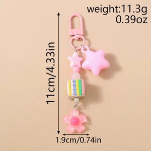 Detailed view of pink floral star keychain with dimensions 11cm length and 1.9cm width