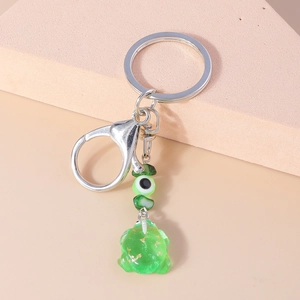 Funny green frog keychain with translucent resin pendant and evil eye bead charm