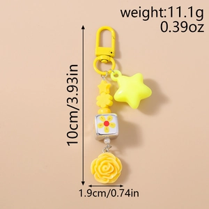 Detailed view of yellow floral bead keychain with star charm and size measurements