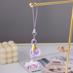 Macro detail of dopamine style purple candy acrylic pendant and matte chain links