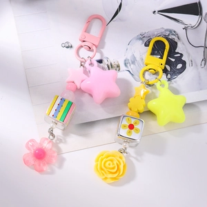 Fashionable floral cube keychain with star bead and acrylic flower charm in candy colors