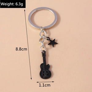 Detailed size view of black guitar keychain with skull pattern and star charm