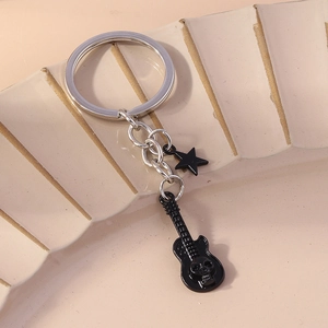 Guitar keychain with black skull design and star pendant for backpack decoration
