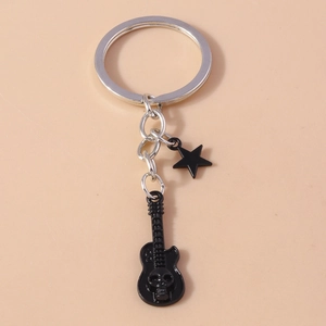 Punk style guitar keychain with skull motif and star pendant on a silver metal ring