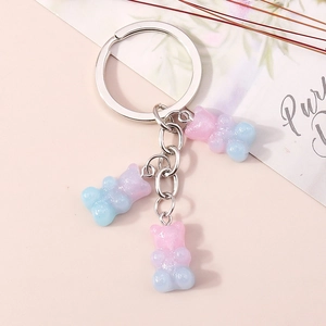 Detail of creative gradient gummy bear pendants on a high-quality silver metal keychain