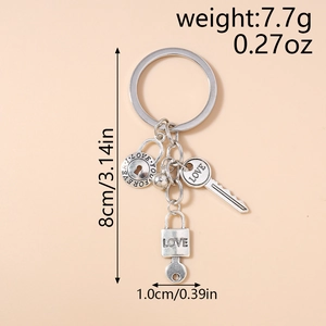 Detail view of silver LOVE key and lock keychain with weight and size specifications