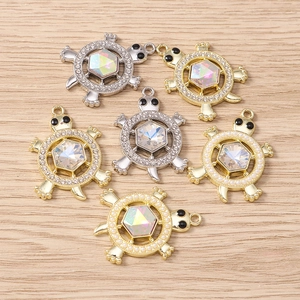 Enamel turtle pendants with rhinestones and crystals in gold and silver finish