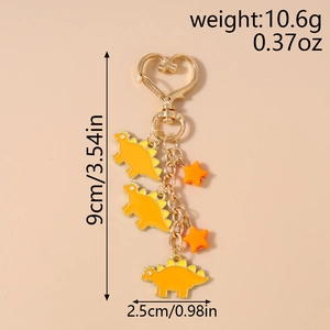 Detailed view of orange dinosaur keychain with dimensions 9cm length and 10.6g weight