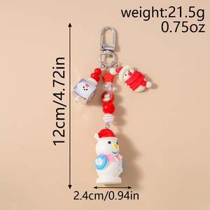 Détail du porte-clés bonhomme de neige avec perles rouges et étoile, taille 12x2,4cm