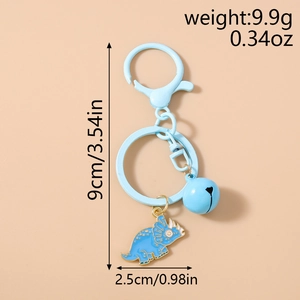 Detail of light blue triceratops keychain with matching bell and dimensions