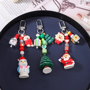 Porte-clés de Noël avec bonhomme de neige et Père Noël avec fermoirs métalliques