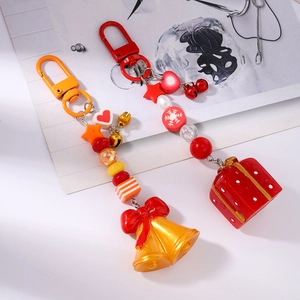 Porte-clés de Noël avec perles, cloches et breloques de boîte cadeau en rouge et orange