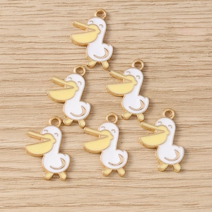 Détail de 6 breloques pélican en émail avec bords dorés pour porte-clés DIY