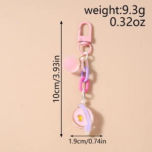 Porte-clés planète rose et violet montrant les dimensions 10cm x 1,9cm et poids 9,3g