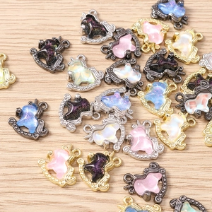 Macro shot of colorful enamel unicorn charms for DIY bracelets and jewelry making