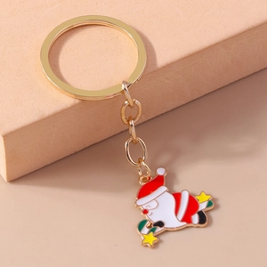 Porte-clés Père Noël en dessin animé avec anneau doré et pendentif festif en émail