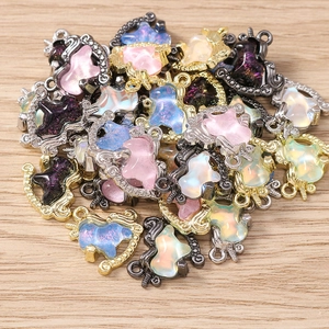 Colorful enamel unicorn pendants for DIY jewelry making in various metallic frames