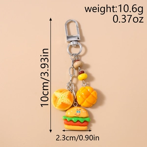 Detail view of the miniature hamburger and bread keychain with size measurements